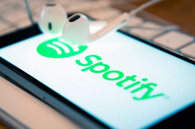 spotify-logo-phone-headphones-2018-billboard-1548